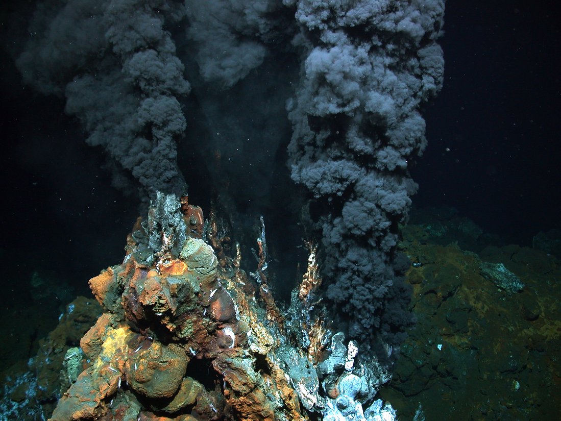 Black smoke rises from hydrothermal vents in the deep sea 