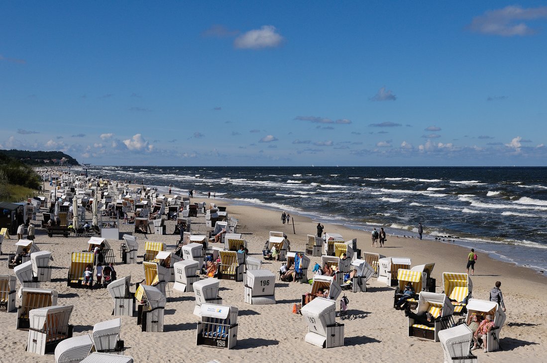 Sunny beach at the german island usedom with beach chairs.